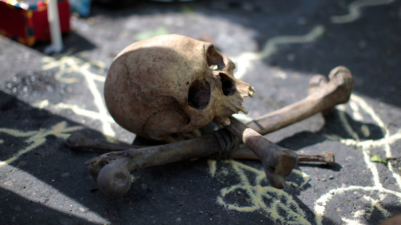 Grave robbers dig up skeletons, scatter bones around Manchester cemetery