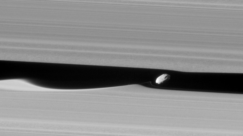 NASA’s Cassini craft captures Saturn’s ‘wavemaker’ moon like never before (PHOTOS)