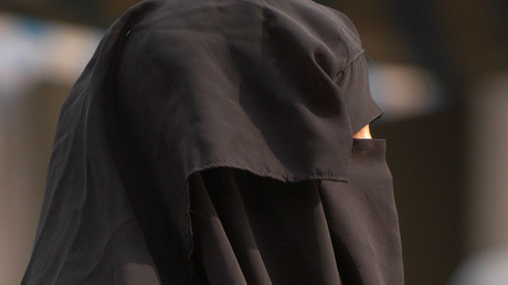 ‘Embarrassing’ anti-burqa posters add fuel to fire in Swiss naturalization debate