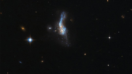 When galaxies collide: Moments of 'doom' captured majestically by Hubble (IMAGE)