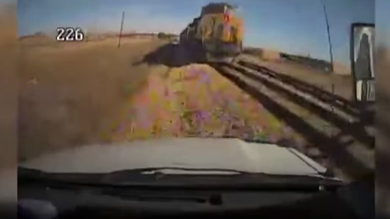 Horrifying collision of train & bus captured on camera (GRAPHIC VIDEO)