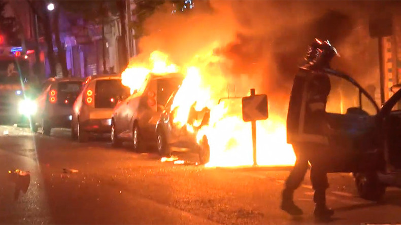 Burned-out cars & police brutality: VIDEOS capture violence in France amid presidential vote