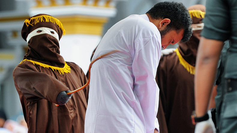 Gay pair caned in Indonesia as crowd cheers & takes pictures