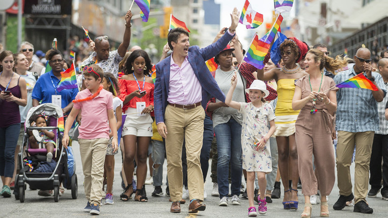 Trudeau celebrates ‘multiple layers of identities’ with Pride Mubarak socks (PHOTOS)