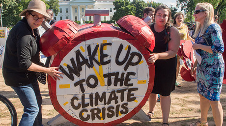 Theresa May accused of ‘subservience’ to Trump over tepid reaction to climate decision