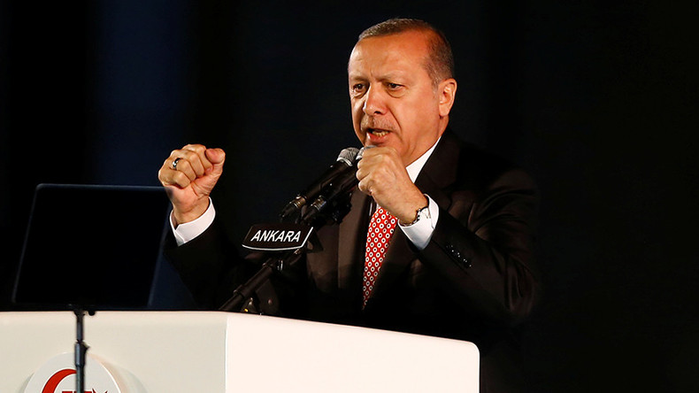 Erdogan vows to ‘chop off heads of traitors’ at coup anniversary rally