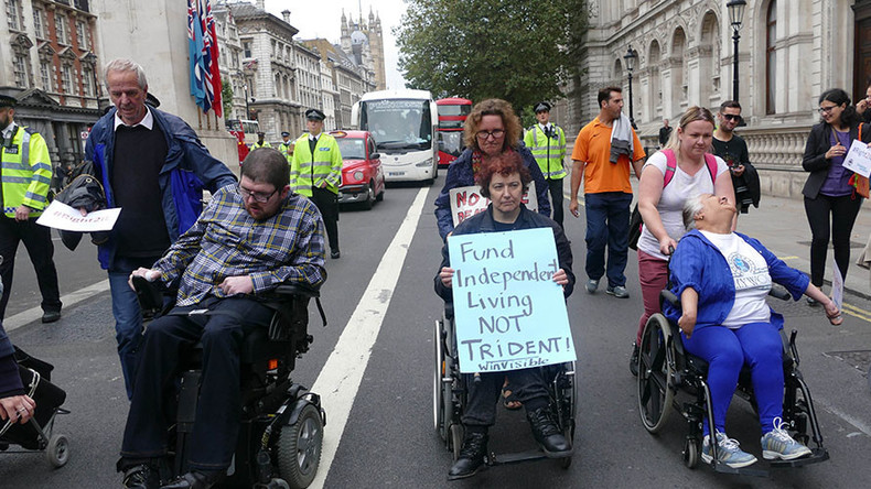 Protesters in wheelchairs block MPs’ entrance to Parliament
