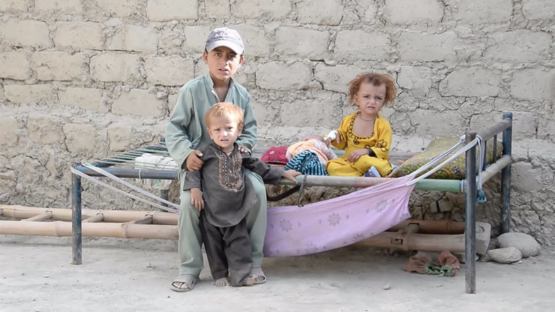 ‘ISIS attacked us, then US bombed our village’: Afghan refugees seek shelter in Jalalabad (VIDEO)