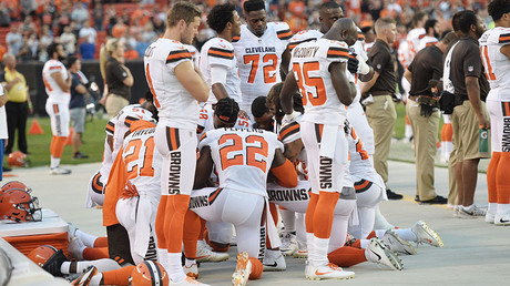 Two white players take part in NFL’s largest anthem protest to date