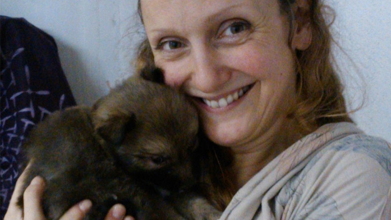 Artist who breastfed dog and fertilized her egg with dog cell wins prestigious prize