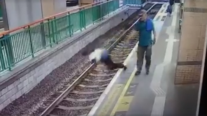 Chilling CCTV VIDEO captures man pushing woman on rail track in cold blood
