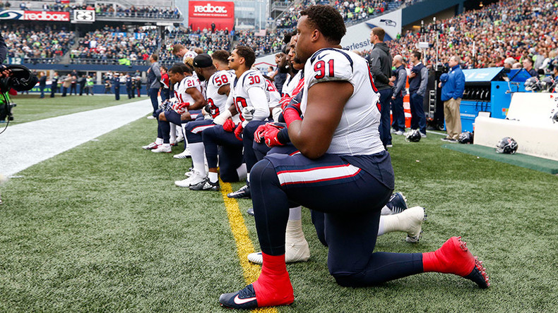 Almost entire NFL team ‘takes a knee’ in protest at owner’s ‘inmates’ remark