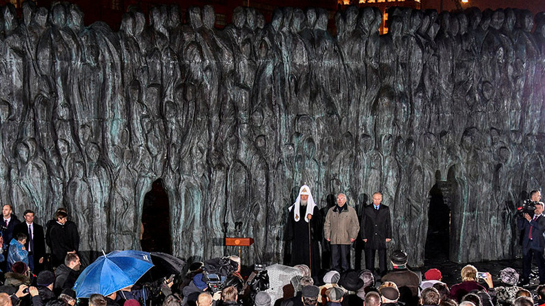 Putin says nothing can justify political persecution as Russia commemorates Stalin victims