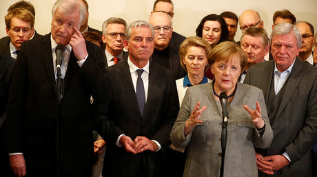 Merkel starts grand coalition talks as poll show 52% wants her off the ballot in 'new election'