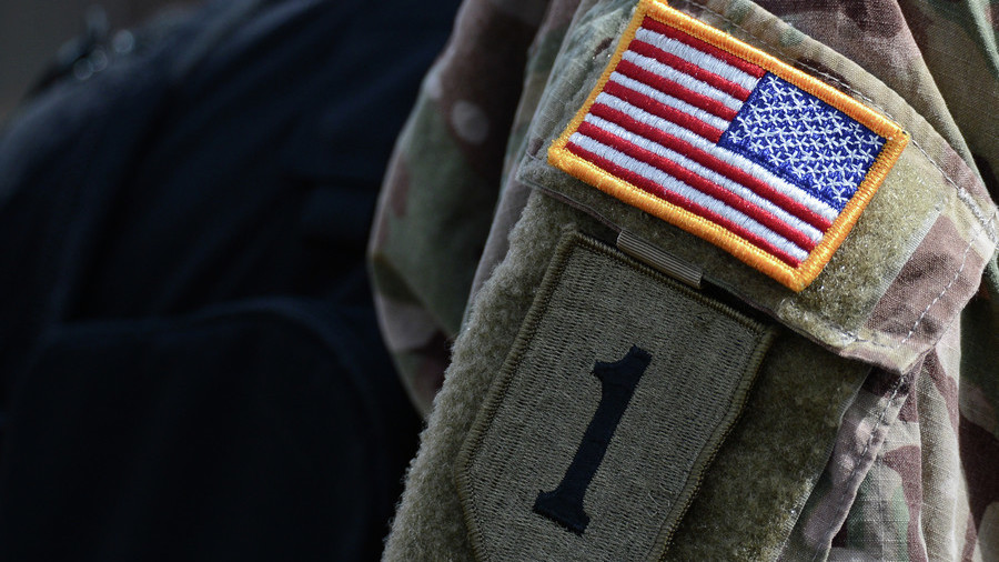 An arm patch on the uniform of a NATO's multinational battalion serviceman