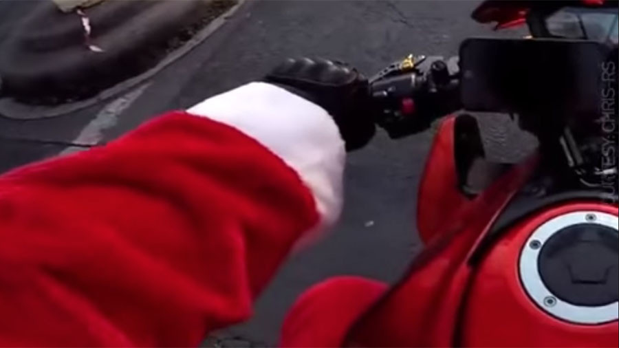 Badass biker Santa chases hit-and-run driver through Paris (VIDEO)