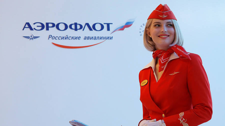 Putin backs Aeroflot plan to carry Russian football fans for less than $1 during World Cup