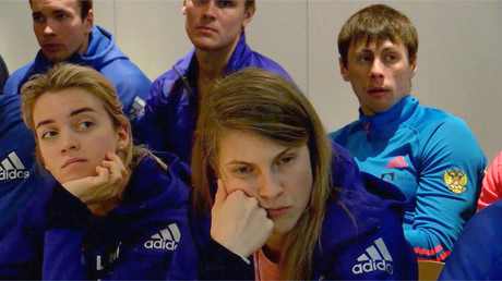 Russian athletes watch fateful IOC announcement of blanket ban of national team (VIDEO)
