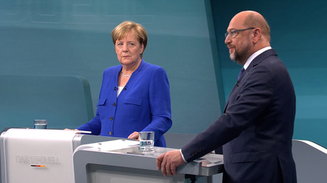 Good match? Merkel & Social Democrats still at odds on major issues as coalition talks gets underway