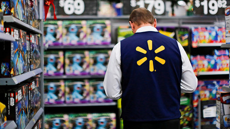 Walmart abruptly lays off 1,000s of workers, but raises pay for others due to tax reform