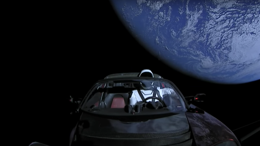 Tesla reports skyrocketing losses as Musk shares ‘last pic’ of his roadster en route to Mars