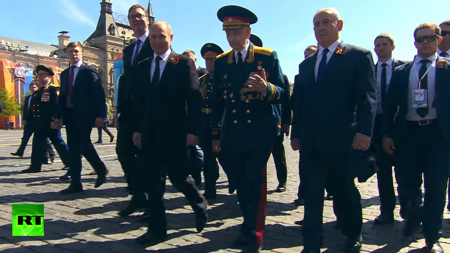 WWII veteran who walked with Putin after being pushed by his guards tells RT of his many battles