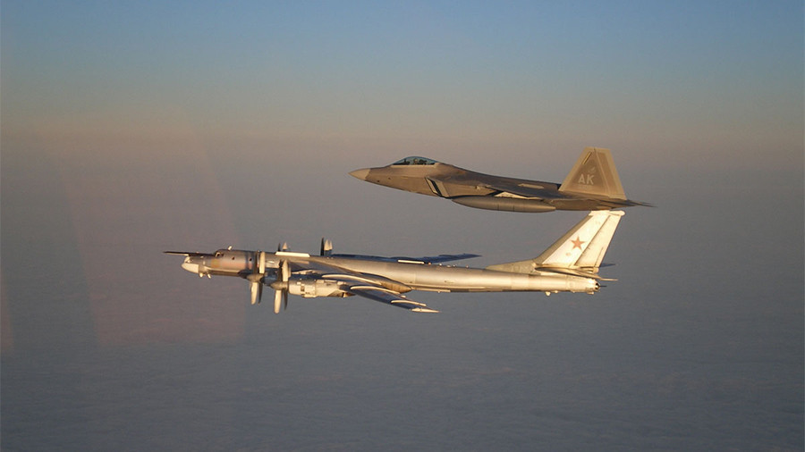 Russian strategic bombers escorted by US F-22 over neutral Arctic waters – MoD