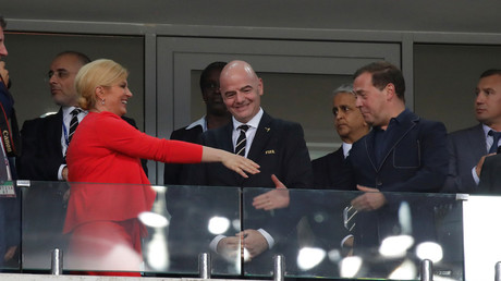 Russian Prime Minister, Croatian President shake hands at World Cup quarter final (PHOTOS)