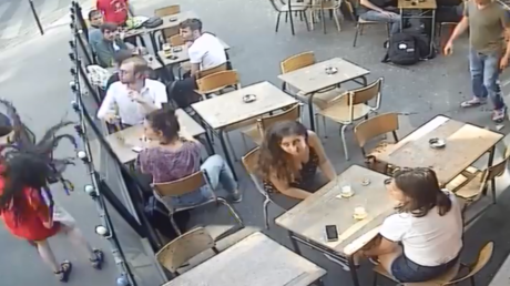 ‘Harassment is everyday’: Wolf-whistling thug punches young woman outside Paris cafe (VIDEO)