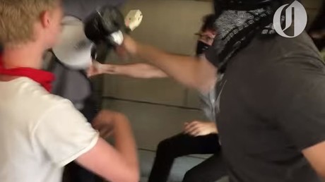 Black-clad group protesting police brutality stage brutal attack outside Portland city hall (VIDEO)