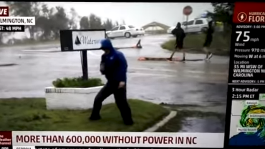 Hang in there! Weather anchor dramatically braces against Hurricane Florence winds (VIDEO)
