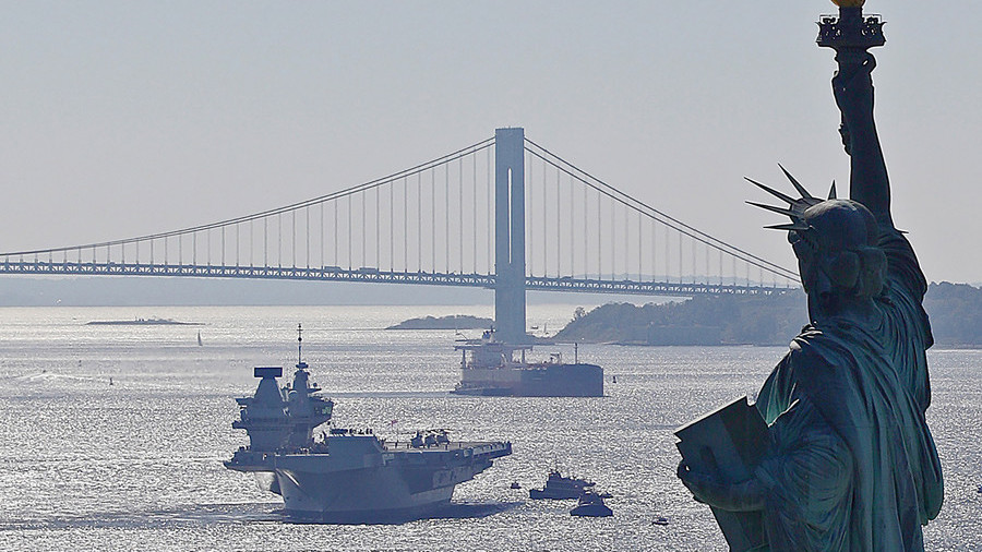 Britain’s biggest warship parks off the US coast, looking just a little bit needy