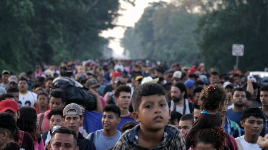 Republicans & Democrats may bark and bite, but the migrant caravan moves on