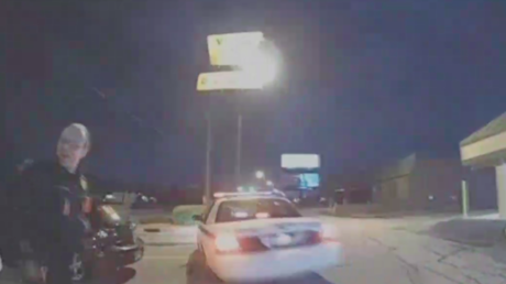 Handcuffed woman steals police car right in front of officers (BODY CAM VIDEO)
