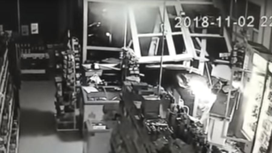 Drunken cop rams his BMW into grocery store & flees (VIDEO)
