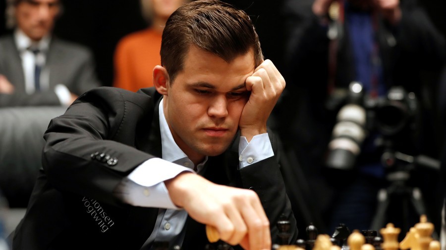 Carlsen beats Caruana in tiebreakers to defend World Chess Championship title 