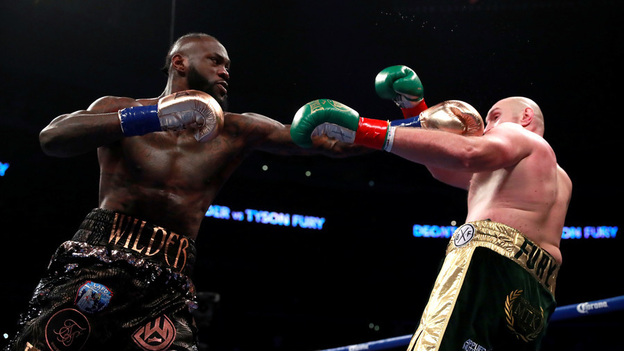 All square! Champ Wilder and plucky Fury scored a draw in heavyweight title fight (PHOTOS)
