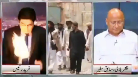 Hot discussion victim: FIREBALL hits Pakistani news presenter during live debate (VIDEO)