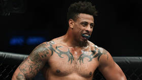 ‘A**HOLE!’ UFC fans express disgust as Greg Hardy disqualified for illegal knee to head
