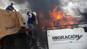 FLAMES devour ‘aid truck’ during bridge stand-off on Venezuela-Colombia border (PHOTOS)