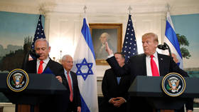 Trump signs declaration recognizing Israel's sovereignty over disputed Golan Heights