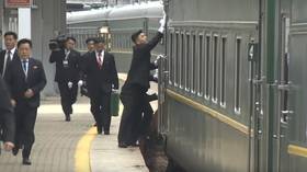 WATCH Kim Jong-un’s bodyguards POLISH his moving train as it arrives in Russia’s Far East