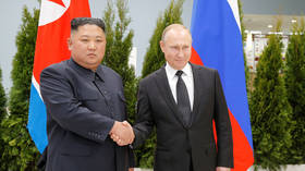 First handshake: Putin greets Kim on historic visit to Russia (VIDEO)