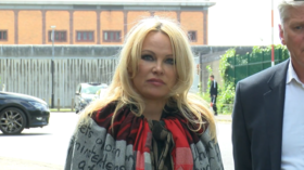'We need to save his life': Pamela Anderson speaks of emotional visit to Assange prison