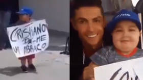 'Cristiano, give me a hug': Ronaldo stops team bus to take photo with sick young fan (VIDEO)