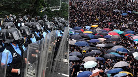 Scuffles as 10,000s of protesters march in Hong Kong to oppose extradition bill (PHOTOS)