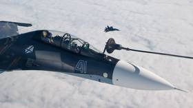 WATCH two Russian Sukhoi fighter jets refueling mid-air in stunning POV-style VIDEO