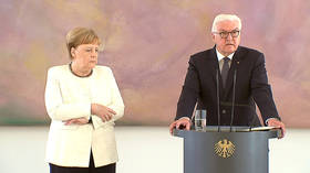 Angela Merkel shakes AGAIN during official ceremony (VIDEO)