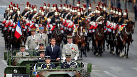 Macron booed & told to ‘step down’ during Bastille Day parade in Paris (VIDEO)