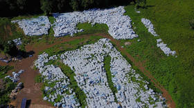THOUSANDS of unopened bottles of water meant for Puerto Rico hurricane victims found in field… AGAIN